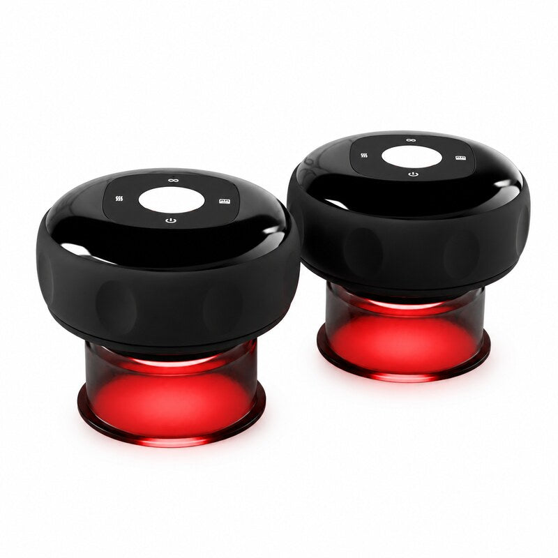 A pair of Vela X Smart Cupping Massagers: small glossy black devices with translucent red cups that glow
