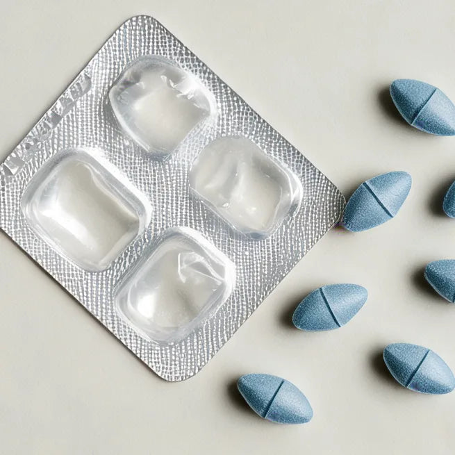 A blister pack and loose prescription tablets